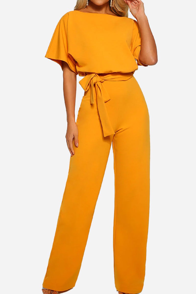 Chic short-sleeved wide-leg jumpsuit in vibrant yellow with waist belt and elegant fit