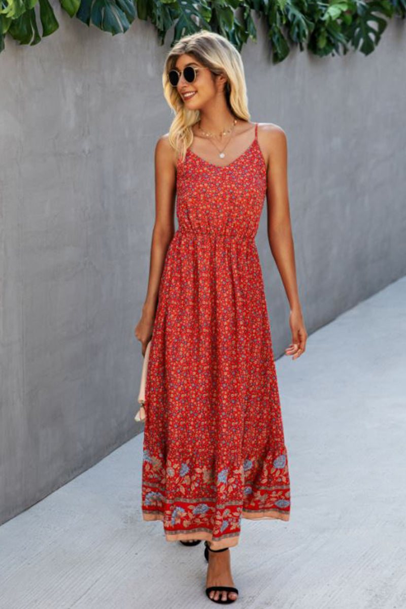 Woman wearing a casual vintage flower prints maxi dress with spaghetti straps and elastic waist