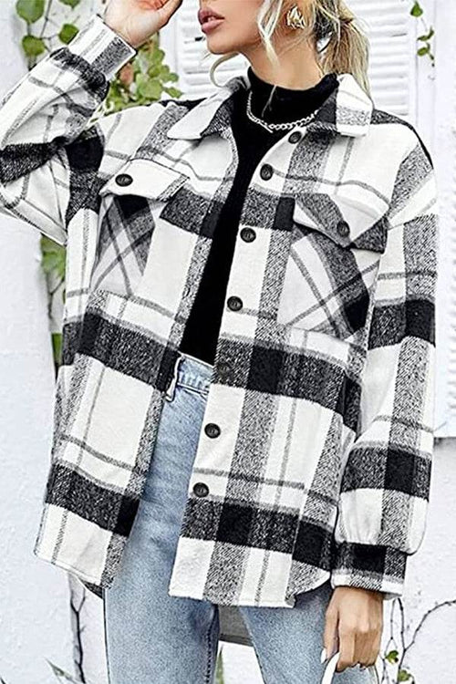 Women’s long sleeve plaid flannel shirt in black and white check pattern with button closure and casual fit