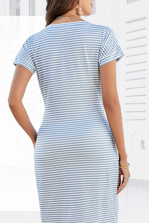 Back view of woman wearing Airy Stripe Sheath Cotton Dress with blue and white stripes and short sleeves
