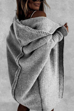 Gray warm oversized hooded cardigan with relaxed fit and cozy knit fabric worn off-shoulder