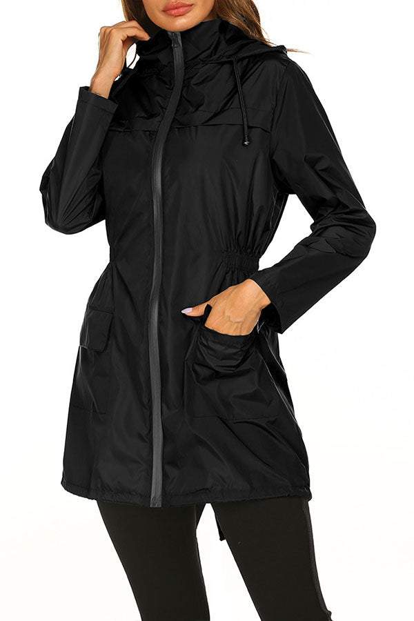 Black outdoor and travel hooded raincoat windbreaker jacket for women with zipper and pockets