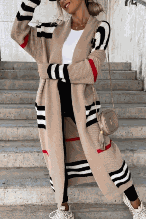cozy striped long knitted cardigan with oversized fit and bold black and red stripes on beige knitwear