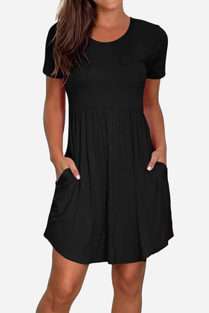 Black short-sleeved pleated dress with pockets and a modest, flattering cut