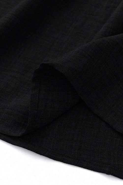 Close-up of lightweight black fabric used for high waist wide leg pants