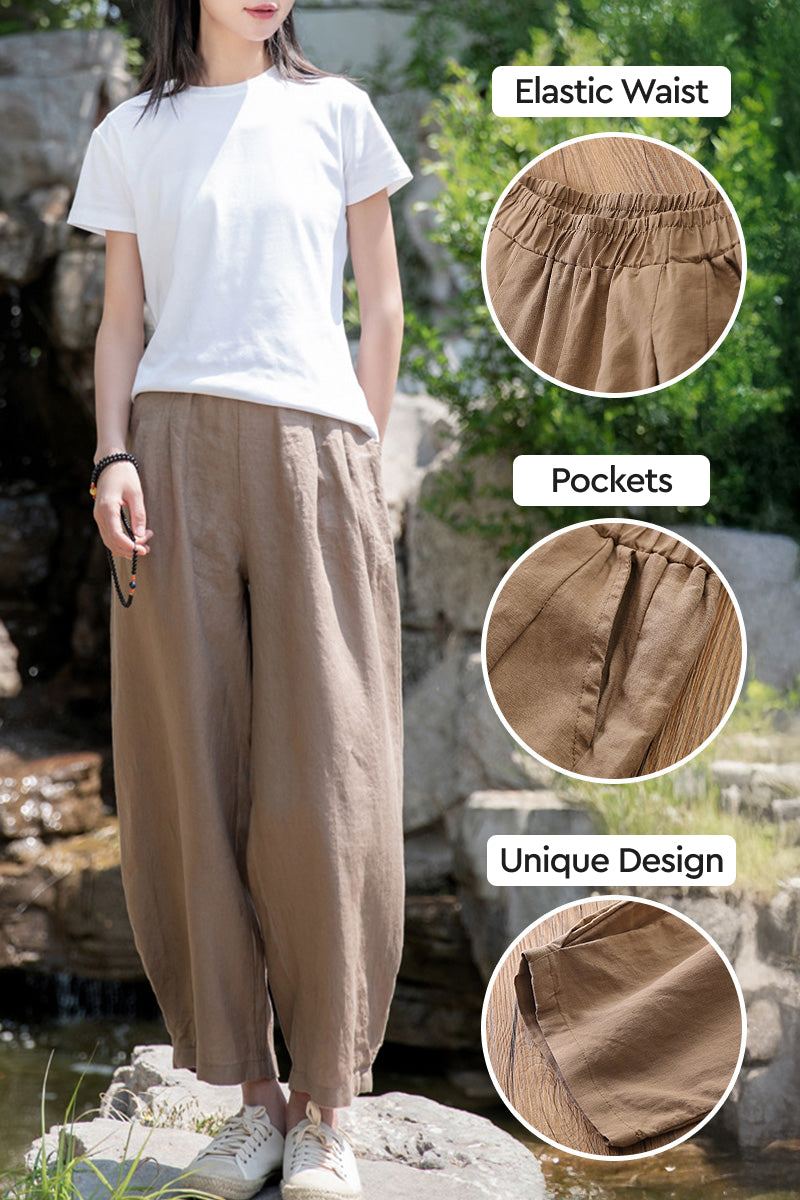 Woman wearing brown Ramie Linen Cotton Pants with elastic waist, pockets, and unique design outdoors