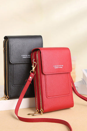 Anti-theft travel crossbody phone pouch in black and red PU leather with zipper compartments and adjustable strap
