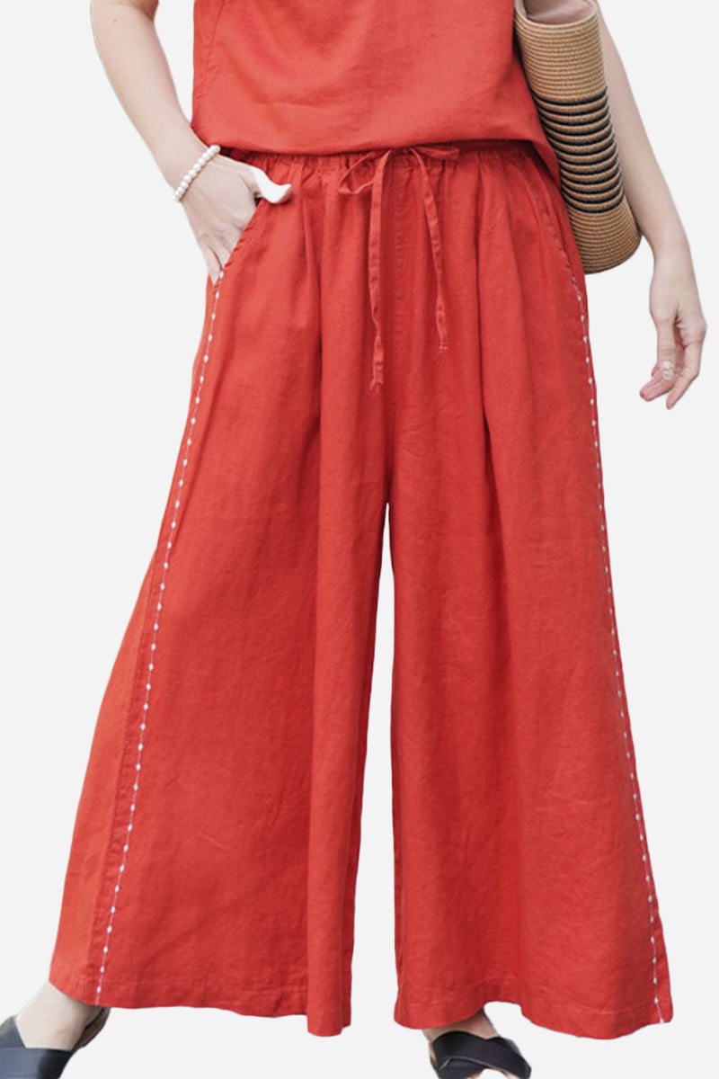 Red wide-leg pants made of 100% linen with elastic waist and one size fits all design