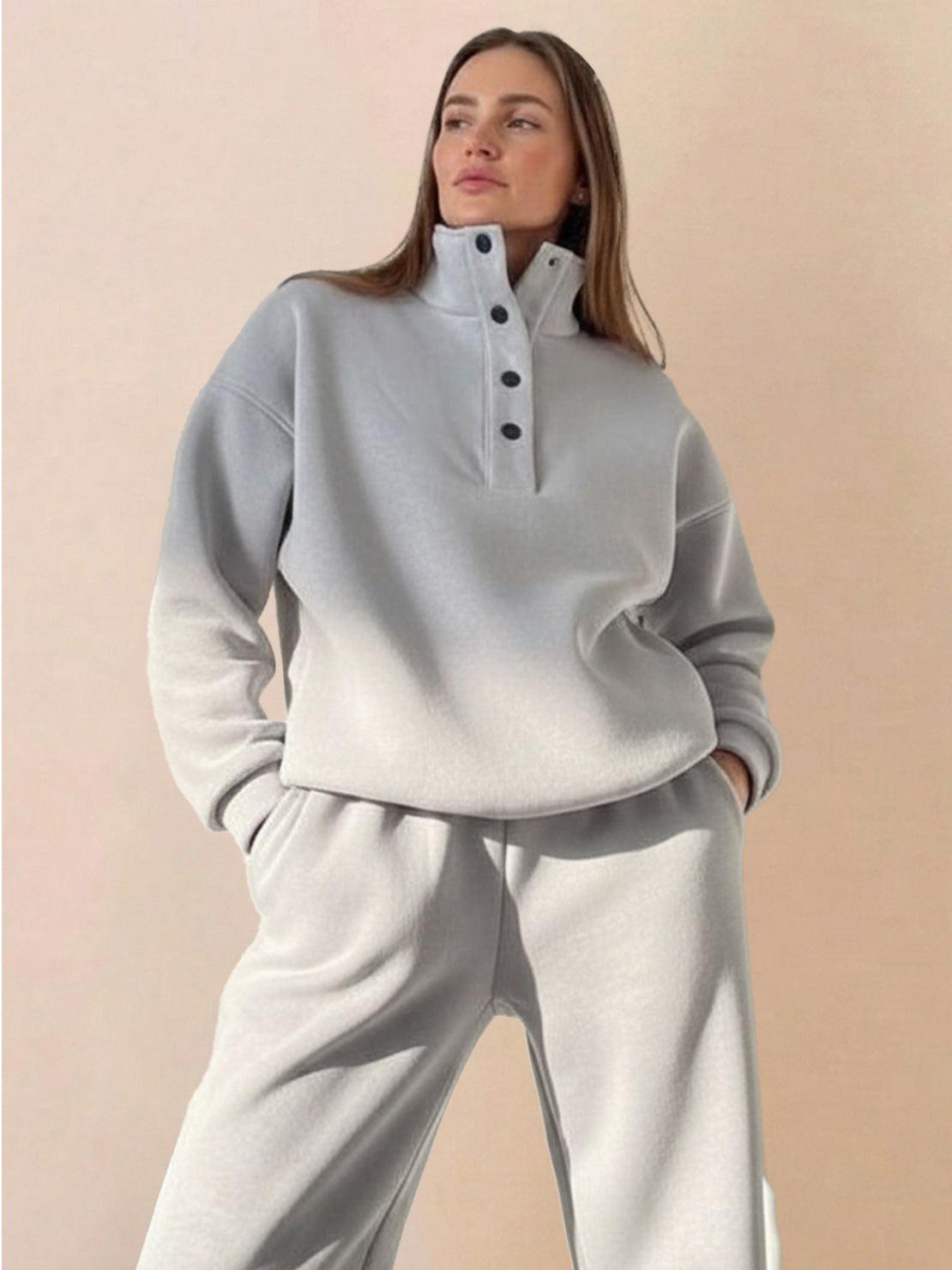 Woman wearing Warm & Easy Two-Piece Set in soft grey with relaxed fit and button-collar pullover hoodie and matching pants