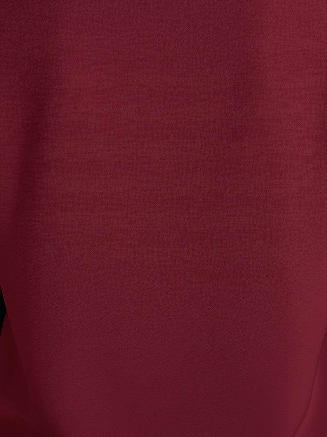 White pleated V-neck long-sleeve blouse with button cuffs and relaxed fit