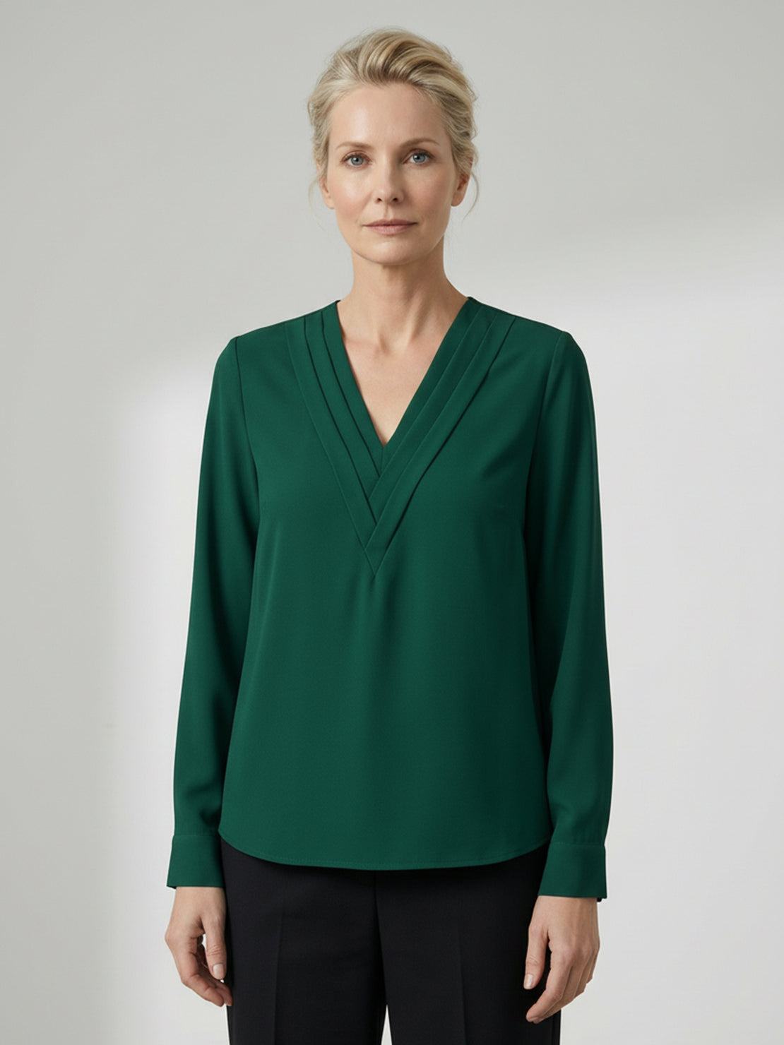 White pleated V-neck long-sleeve blouse with diagonal panel and button cuffs