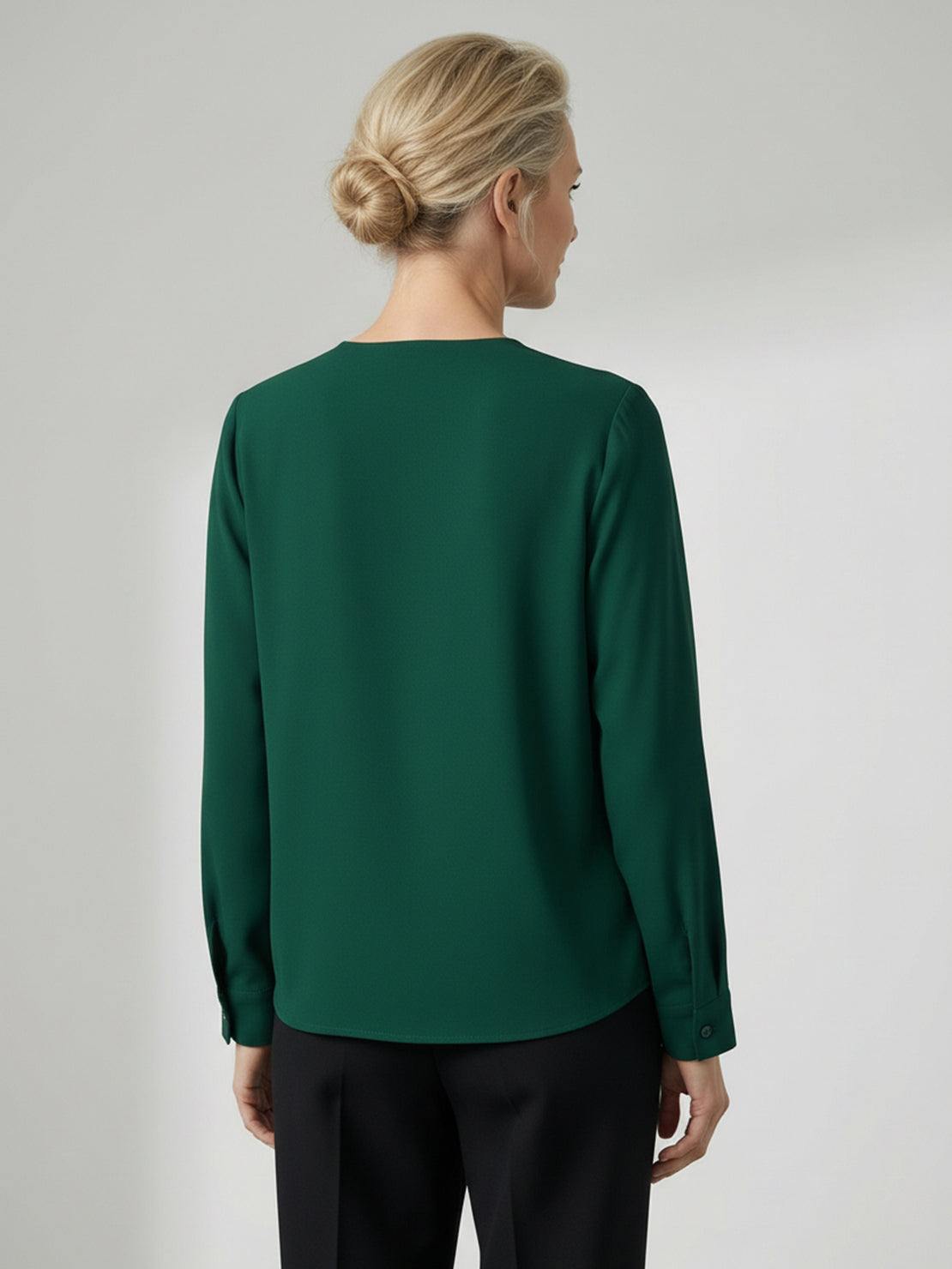 White pleated V-neck long-sleeve blouse with button cuffs and relaxed fit