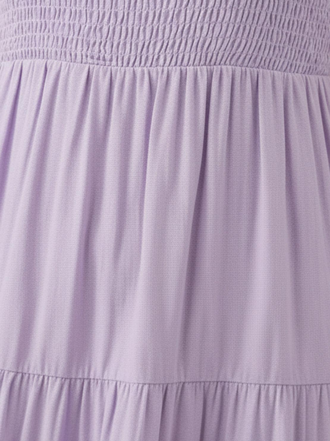 Smocked sleeveless maxi dress with tiered skirt and breathable fabric