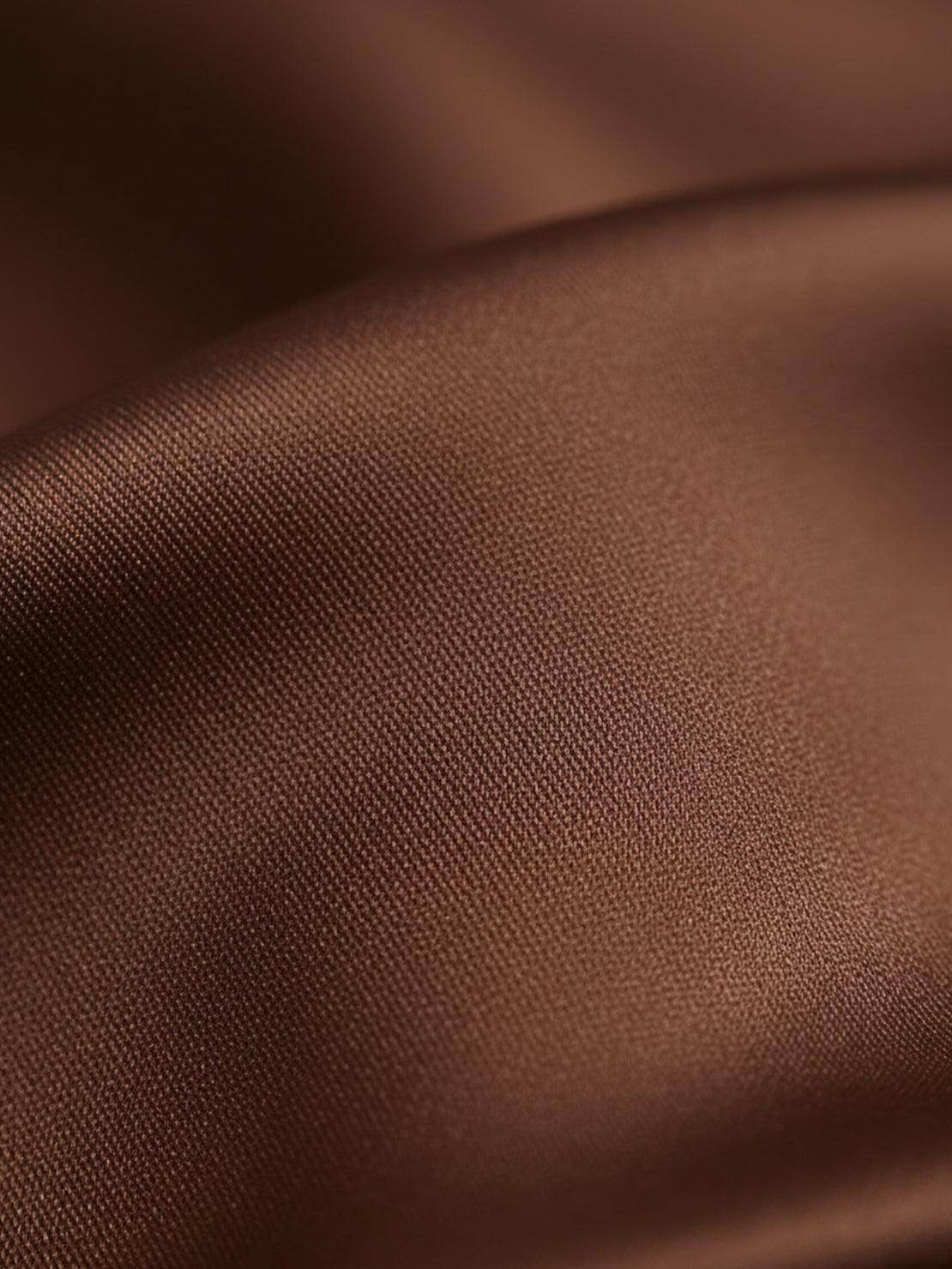 Silk-finish button front shirt with relaxed fit and smooth polyester fabric