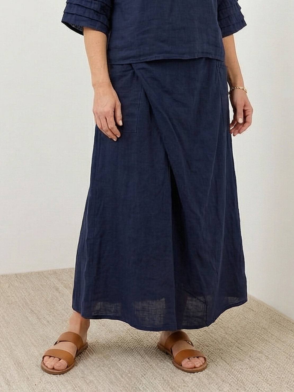 Two-piece 100% cotton wrap skirt and hip-length top with crinkle finish