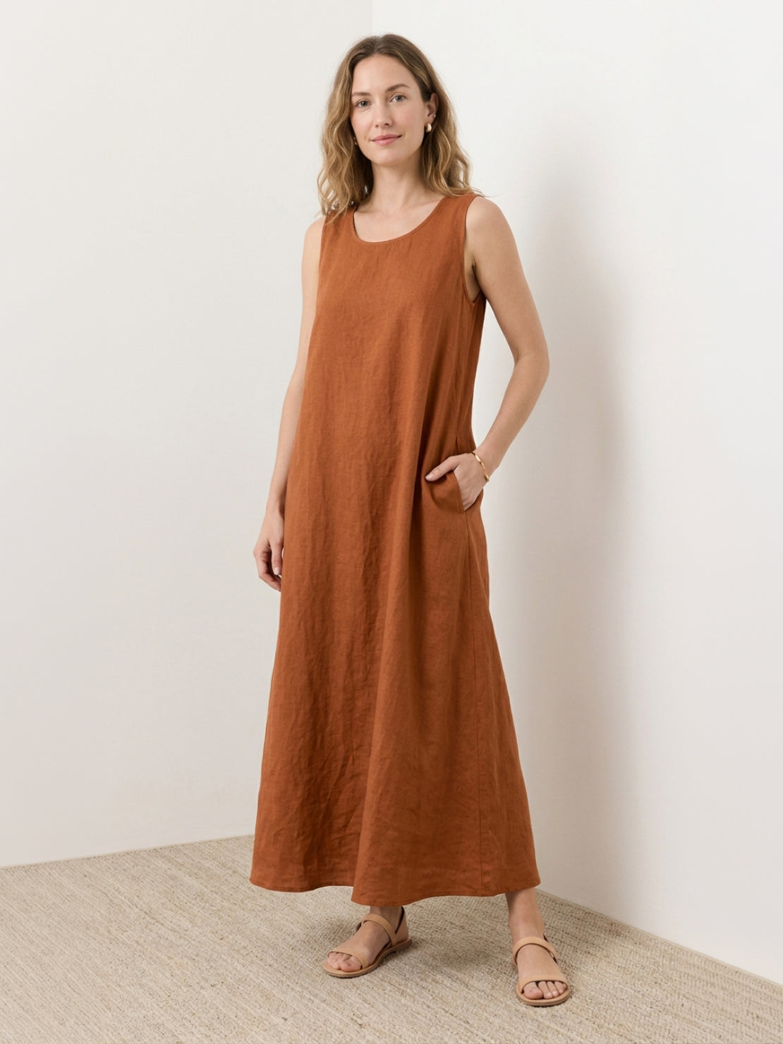 Lightweight cotton linen sleeveless maxi dress with round neckline and flowing ankle-length silhouette