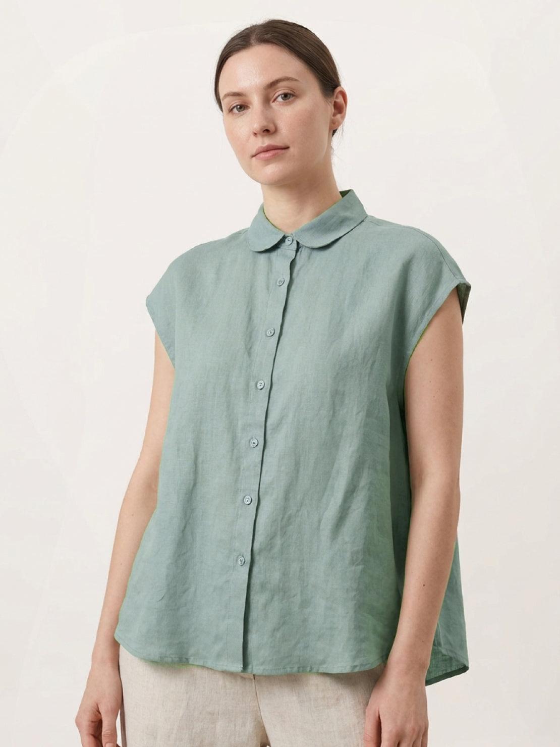 100% linen two-way button blouse with Peter Pan collar and cap sleeves in relaxed A-line silhouette