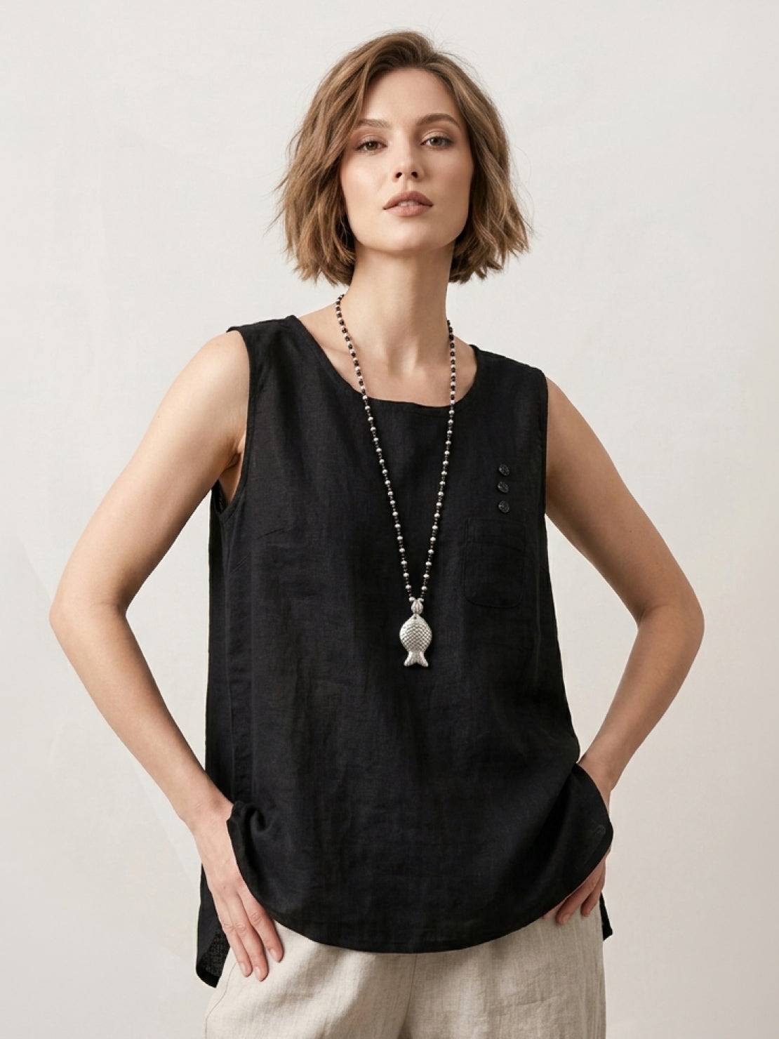 Lightweight sleeveless 100% cotton linen top with curved hem and chest pocket detail