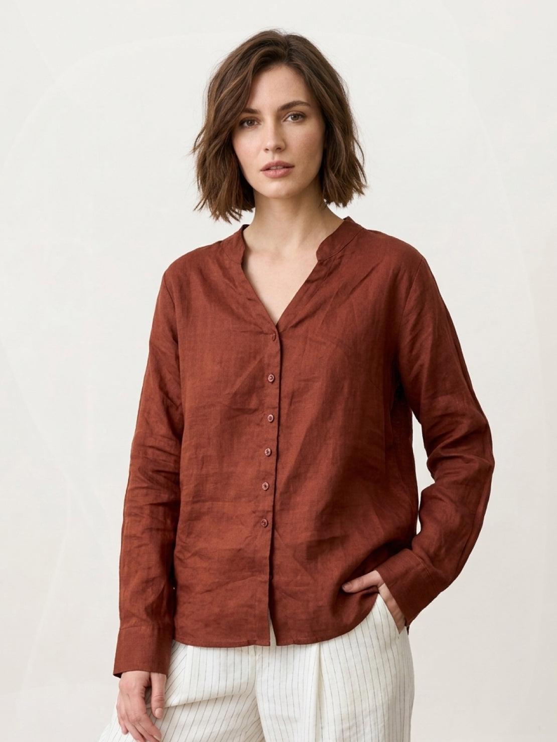 Lightweight 100% linen relaxed fit V-neck shirt with long sleeves and wide cuffs, slightly cropped with curved high-low hem.