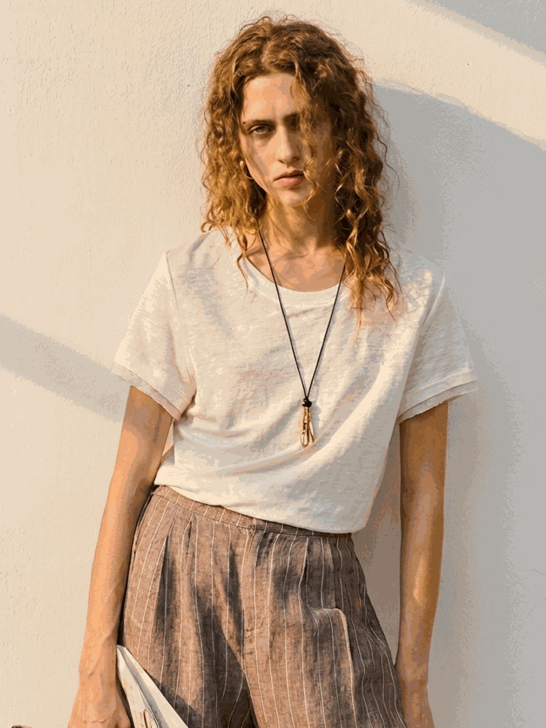 100% linen rolled cuff tee with contrast inner lining, lightweight breathable fabric in white, yellow, and pink