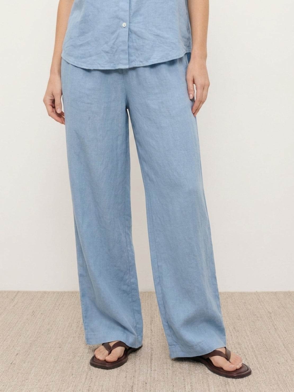 women wearing 100% cotton matching two-piece set with button-front top and wide-leg pants in neutral colors