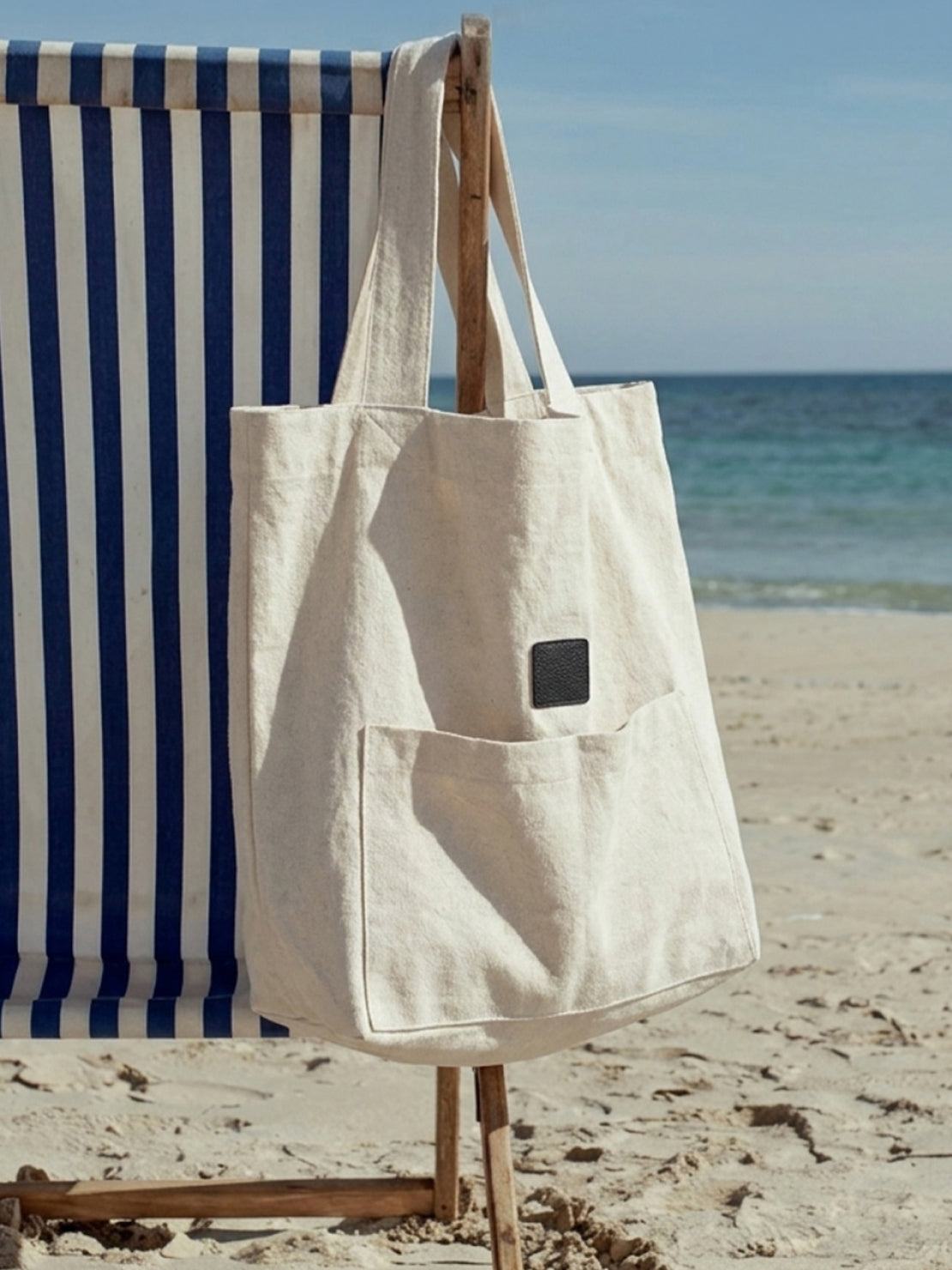 Beige cotton linen canvas shoulder bag with front pocket and comfortable straps, lightweight and spacious for everyday use