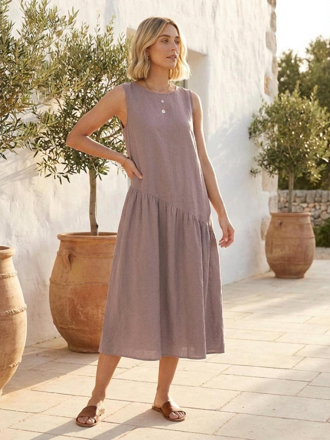 Cotton-linen summer midi dress with tiered skirt and relaxed drop-waist silhouette in light khaki color
