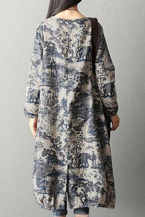 Back view of loose fit Japanese porcelain print midi dress with long sleeves and blue pattern on light beige background