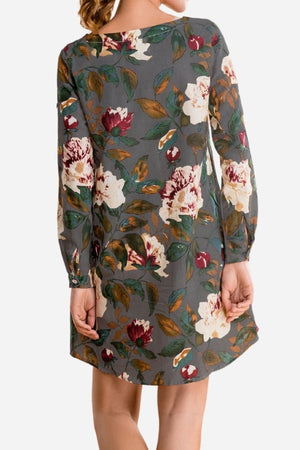 Back view of all over floral print linen shift dress with long sleeves and relaxed fit