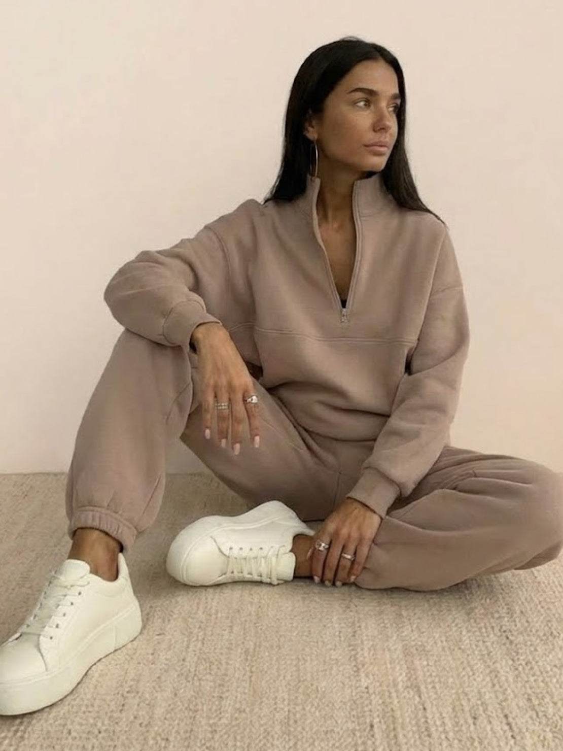 Cotton-blended two-piece tracksuit with high collar and deep zipper in cozy, durable athleisure style