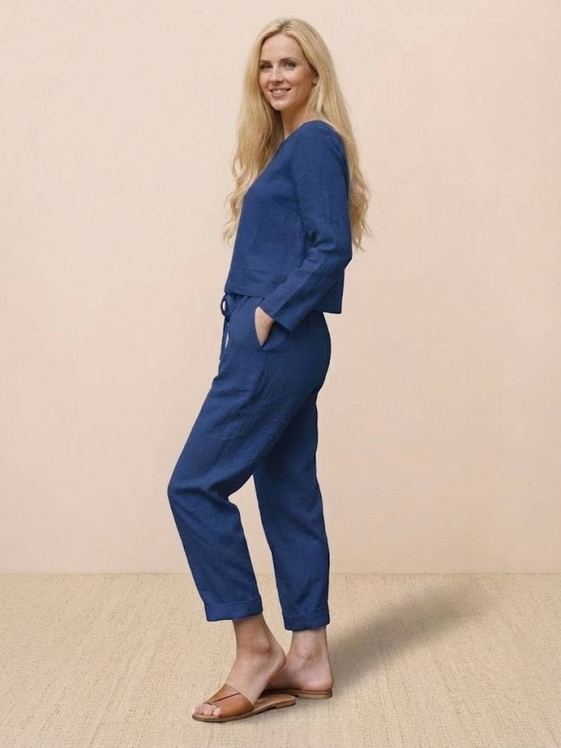 Cotton-linen monochrome capsule outfit with relaxed longline top and wide-leg pants in neutral tones