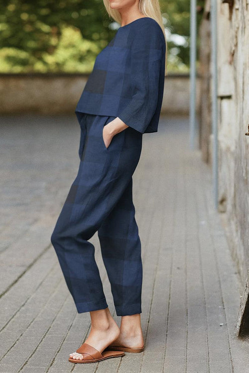 Woman wearing navy blue Cotton-Linen Monochrome Capsule set with relaxed longline top and wide-leg pants outdoors