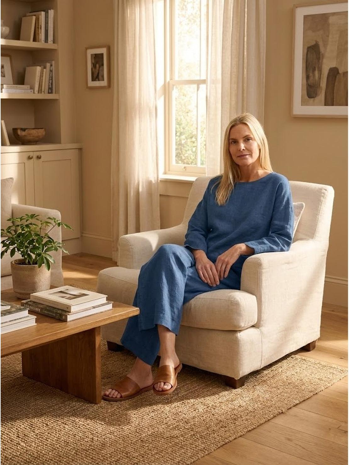 woman wearing loose solid color two-piece set with round-neck pullover and wide-leg pants