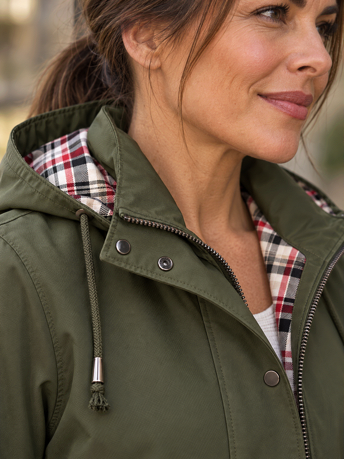 women's plaid-lined hooded rain jacket with waterproof shell and drawstring waist