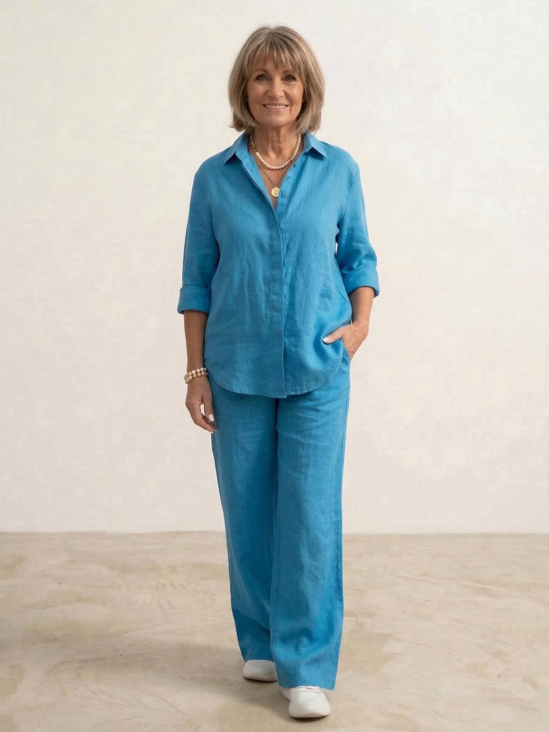 Model wearing an oversized 100% cotton shirt with wide-leg pants co-ord set in a relaxed fit