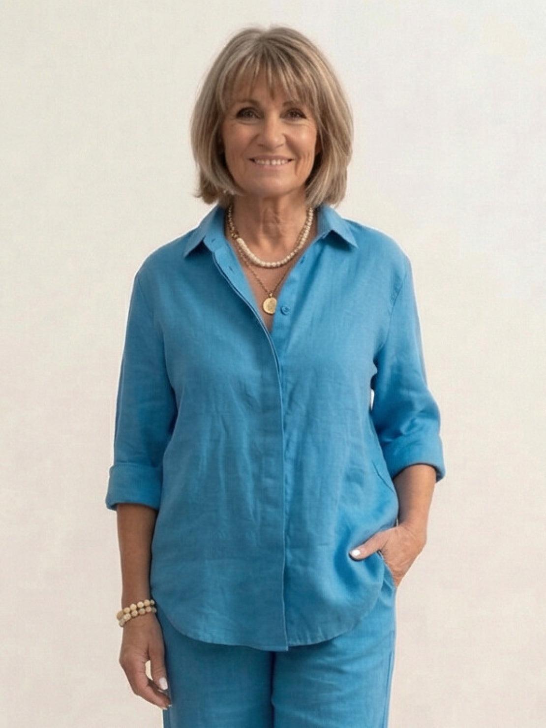 woman wearing relaxed shirt and trousers two-piece set in soft breathable fabric