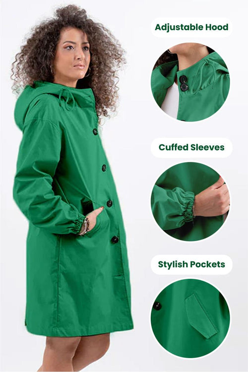 Woman wearing green oversized Rain Couture Windbreaker with adjustable hood, cuffed sleeves, and stylish pockets