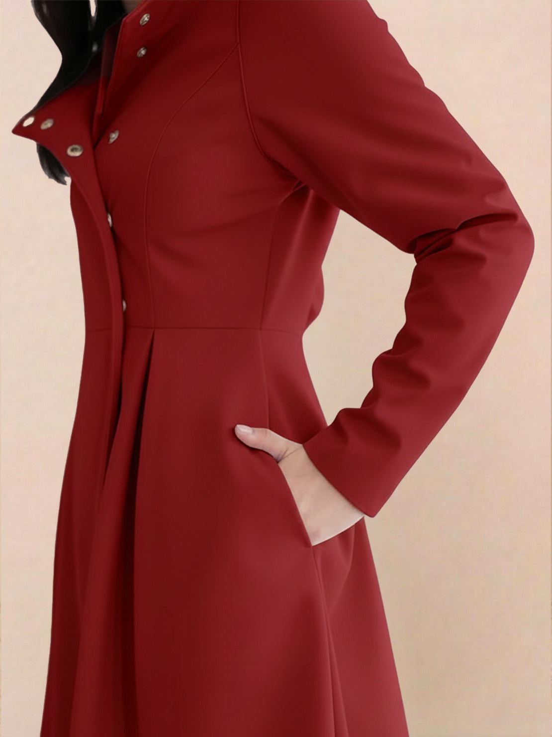 Elegant water-repellent hooded A-line raincoat for women with insulated lining and belt