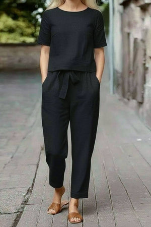Black cotton linen set with relaxed short-sleeve top and straight-leg pants, breathable and lightweight co-ord for casual wear