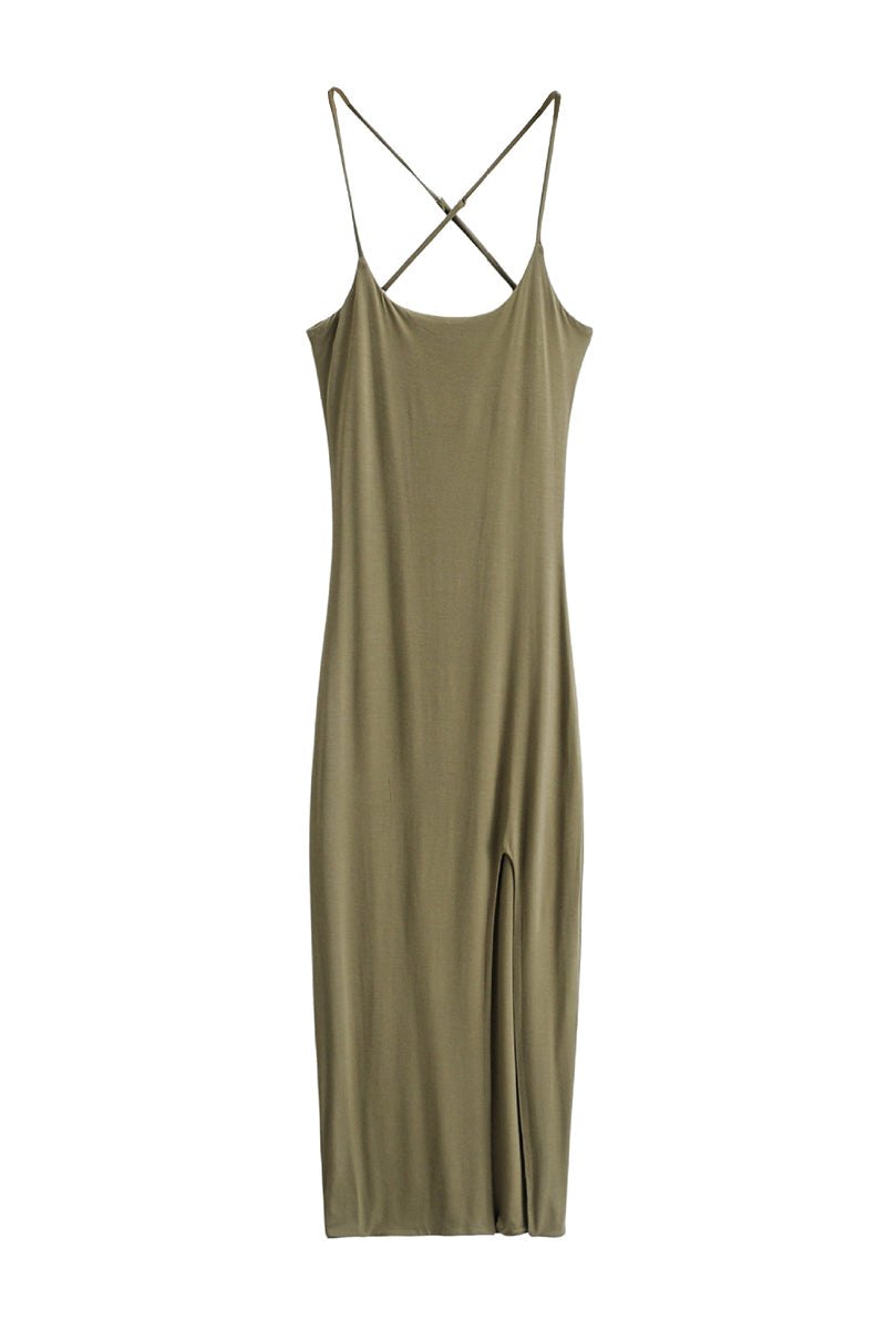 Elegant side slit midi dress in olive green with thin crisscross straps and a flattering silhouette.