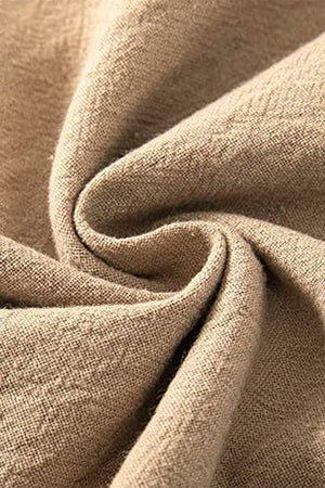 Close-up of beige high-waist cotton linen fabric texture for palazzo pants