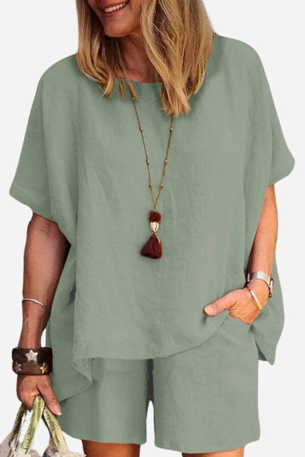 Comfy linen-like shirt and shorts two-piece set in sage green with loose fit and breathable fabric.