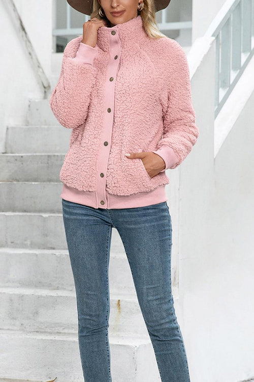 Cozy long sleeve pink sherpa jacket with button closure and fleece lining for warmth and comfort