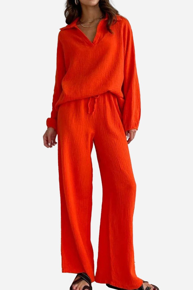 Women's bright orange cotton collared two-piece set with bishop sleeves and drawstring waist pants