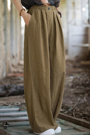 Women’s sandwashed ramie linen pants with relaxed fit and elastic waistband in olive green.