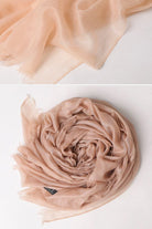100% cashmere featherlight luxury scarf in soft beige, lightweight and warm with a smooth texture