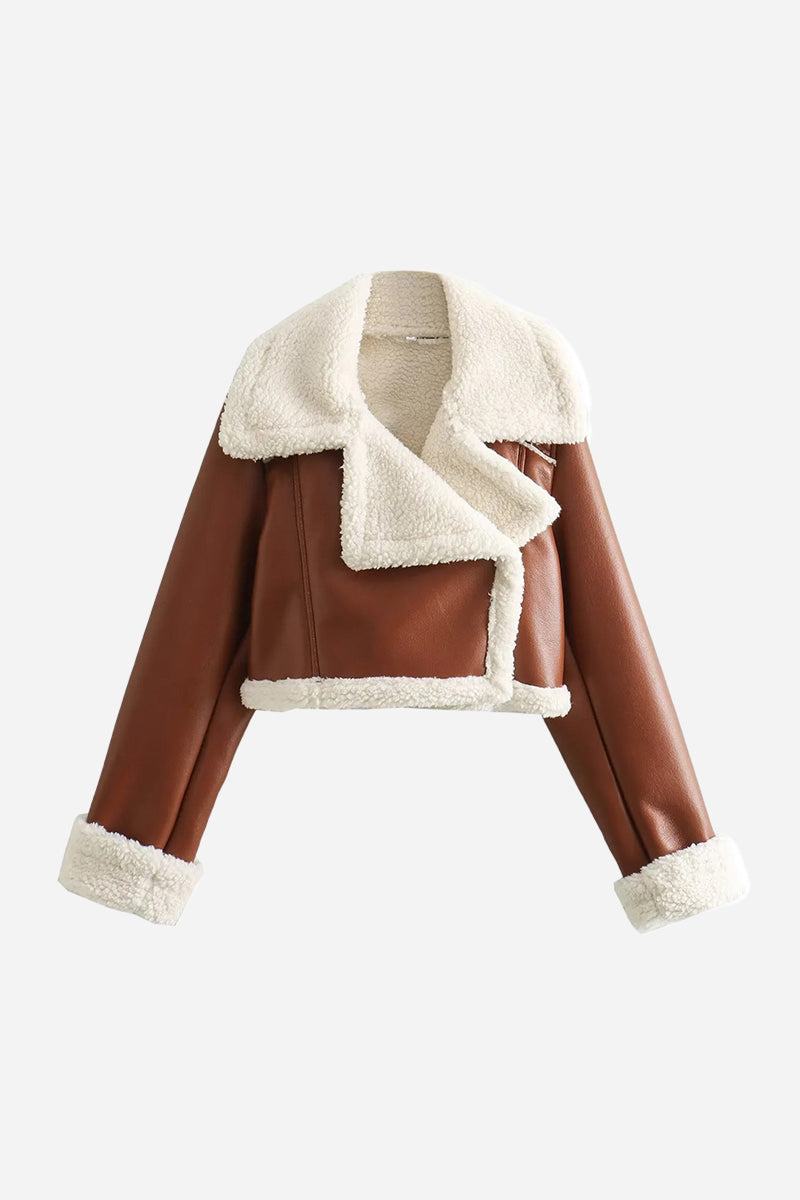 Cropped faux leather jacket with cream sherpa lining and trim, warm and stylish for casual and dressy wear