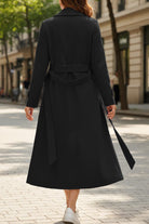 Timeless Retro Belted Trench Coat full-length black belted elegant trench coat with wide lapels and buttoned cuffs on city street background