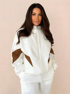 Colorblock Comfort Tracksuit with contrast curved panels in wrinkle-resistant polyester fabric