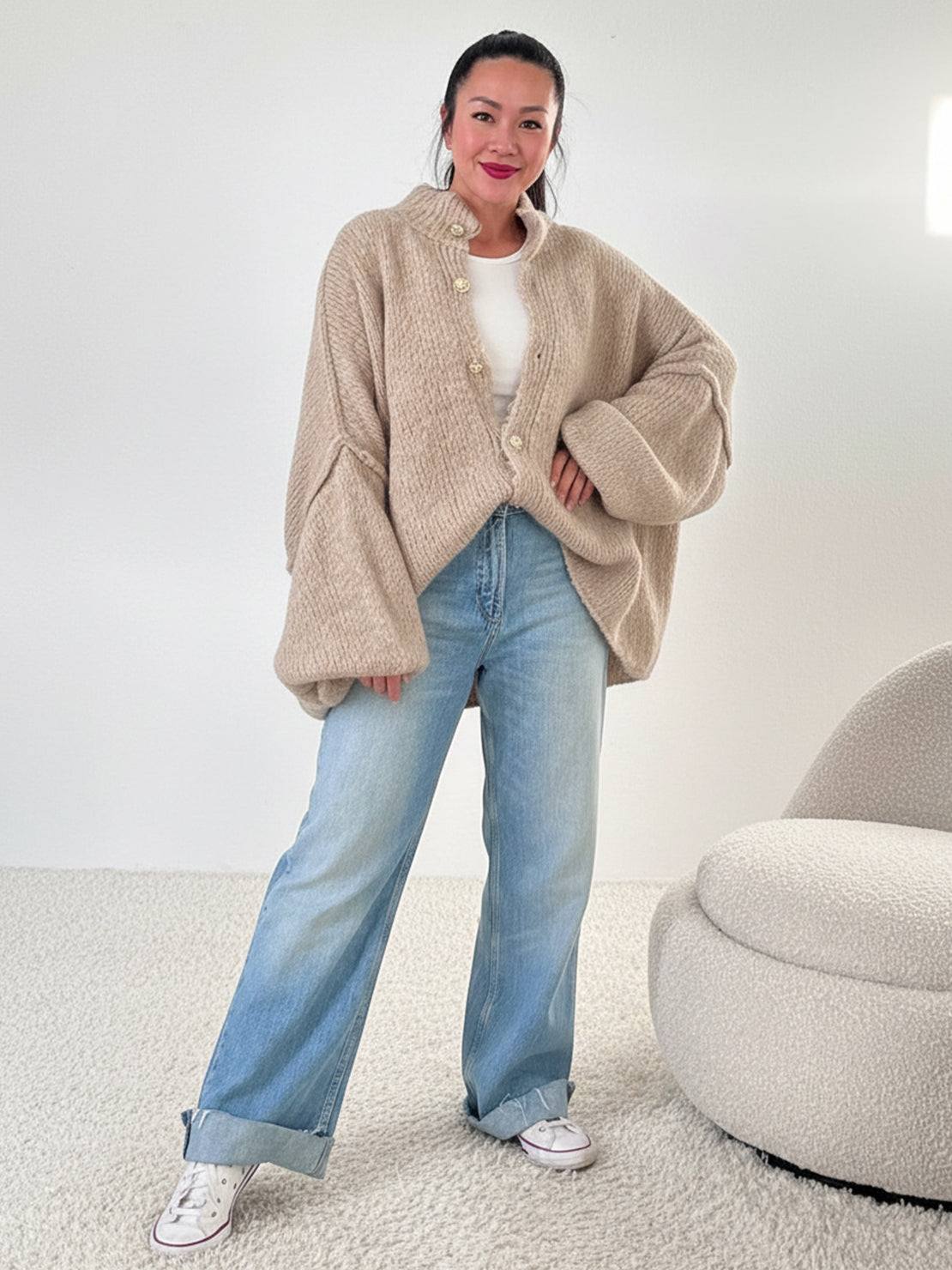 Oversized button-front knit cardigan with balloon sleeves and gold-tone buttons